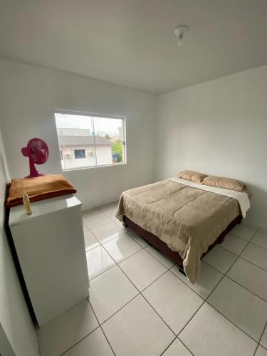 Apartamento no centro com suíte