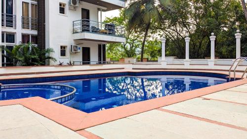 Poolside Paradise 1Bhk Luxury Apartment in Siolim.