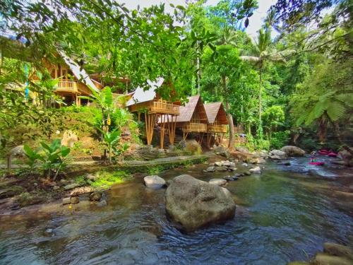 Aksha Riverside Ubud Room Type - Deluxe Double Room with Balcony