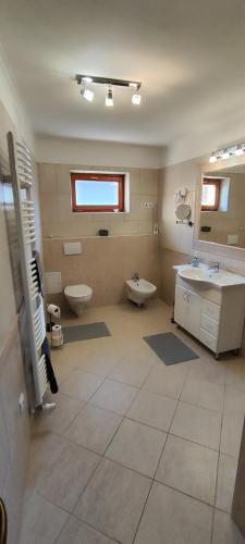 Vannas istaba, Andika Apartman Szajk in Szajk