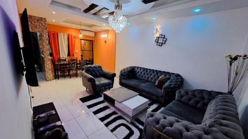 Residence GermanoTech Logbessou appartement meublé 2ch,1salon eau chaude,Wifi,parking,virgile,menagere,canalsat