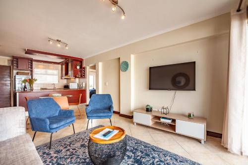 Beachfront 3rd floor 2 bedroom w communal swimming pool- B16 Blouberg - Tap to explore photos