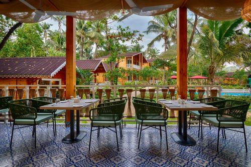 Restaurant, Aralea Beach Resort By Stone Wood in Morjim