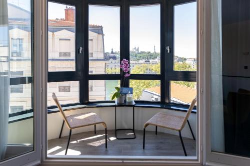 Family Room with Balcony and View