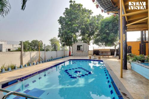 StayVista's The Revolving House - Pet-Friendly, Revolving House with Swimming Pool, Lawn & Indoor-Outdoor Games