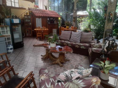 Shared lounge/TV area, Coyaba Tropical Elegant Adult Guesthouse in Quepos