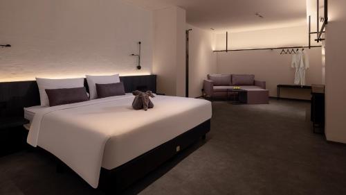 Suite with Balcony room in REZ Hotel Semarang