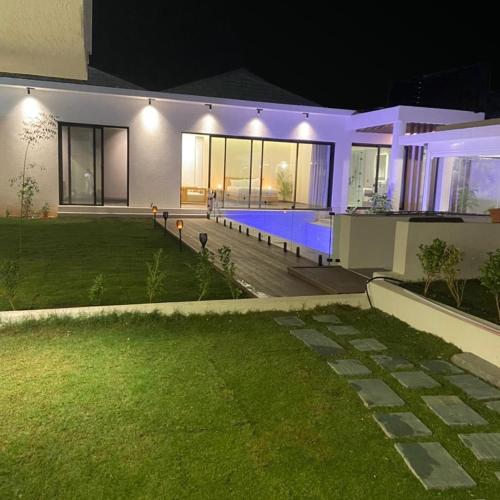 Kert, منتجع تربل فور - Triple Four Resort near Nayef bin Abdulaziz herceg nemzetközi repülőtér