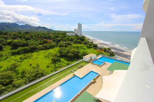 Brand New June 2022 steps from the beach sleeps 4! photo 2