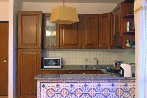 кухня, Delizioso appartamento a Capalbio con vista in Капальбіо