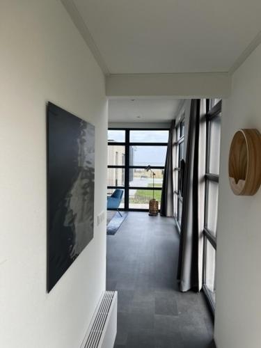 Enkhuizer Strand Chalet Meeresbrise Dritte Reihe mit Zaun Haus Nr 251 in Boerenhoek Molenweg Burgwal