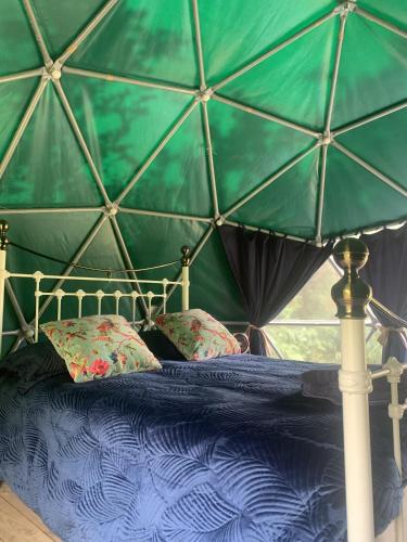 Ceridwen Glamping, double decker bus and Yurts