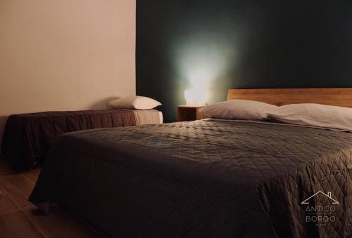 Antico Borgo Rooms - Tap to explore photos