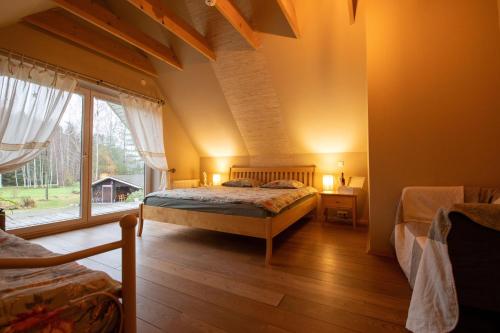 Viesu un ciemiņu brīvdienu māja Villa VĒJROZES (Viesu un cieminu brivdienu maja Villa VEJROZES) in Melturi