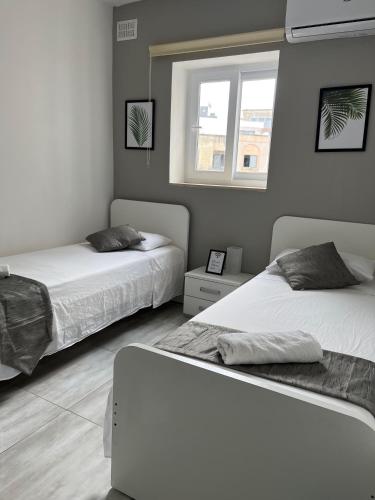 F3 Room 3, Private Room two single beds shared bathroom, Msida (fotografie 2)