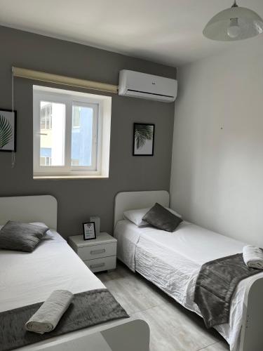 F3 Room 3, Private Room two single beds shared bathroom, Msida (fotografie 3)