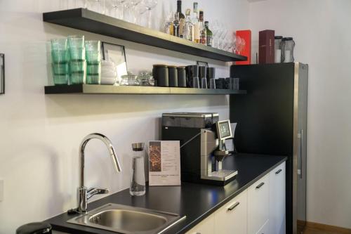 sala de TV, Guesthouse DiWINE in Meran