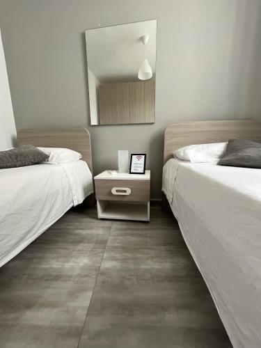 F9-2 Room 2 single beds shared bathroom in shared Flat in Msida