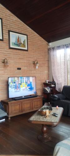 Shared lounge/TV area, Cantinho do Sossego in Guaruja