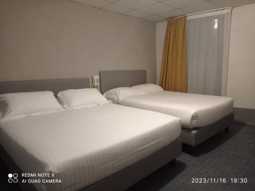 Triple Room (2 Adults + 1 Child)