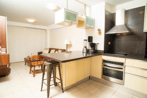 Shared lounge/TV area, Bellos apartamentos en Loma Real, Pampatar in Pampatar