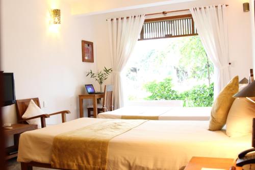 Hoi An Coco River Resort & Spa, Hoi An (photo 4)