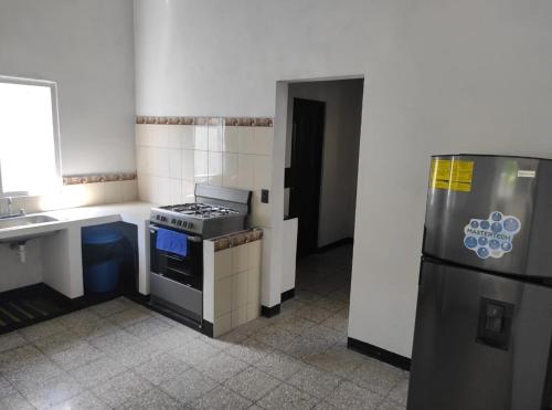 Kitchen, Casa de descanso Grace in Puerto San Jose