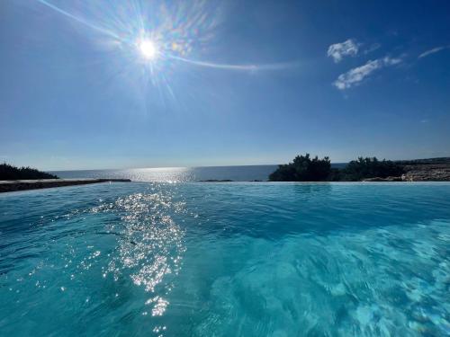 Binisamar Infinity Pool over the sea Binisamar Infinity Pool over the sea