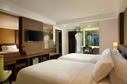 Deluxe Twin Room with Balcony and Free Daily Activity