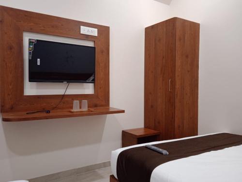 共用Lounge/電視區, Hotel Raheja Residency in 達達爾