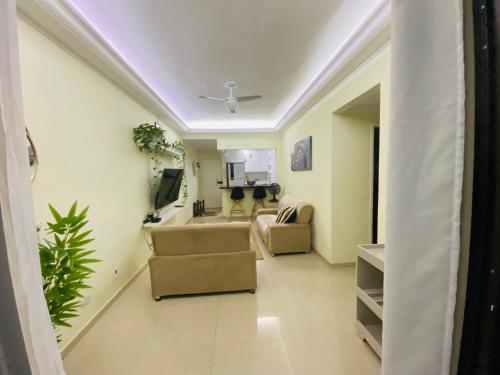 ห้องส่วนกลางสำหรับนั่งเล่น/ดูทีวี, Apartamento Top - Tombo e Asturias in หาดตอมโบ