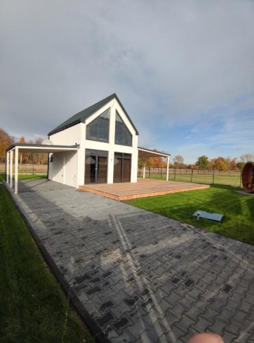 Ferienhaus Laura 70qm bis 5 Gäste mit Fass-Sauna, Whirlpool April bis Oktober, 75qm Terrasse und eingezäunten Garten Haustiere willkommen