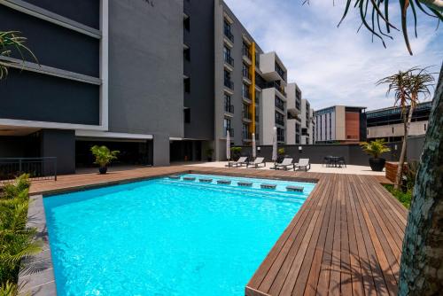 Piscina, Apartament de 36 m2 amb 1 habitació i 1 bany privat a Umhlanga Rocks (Glorystar The Millennial Umhlanga) in Durban