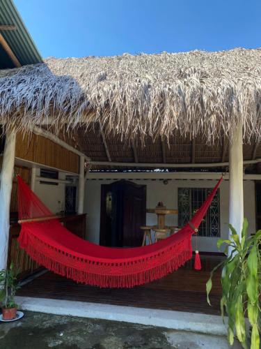 Mauras Tropical Mini Hostel & Tours