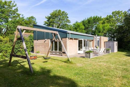 Vista exterior, Vrijstaand vakantiehuis, 5 minuten lopen van het strand in Zoutelande