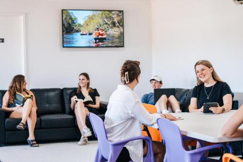 Shared lounge/TV area, Kangarooms Noosa Everglades in Sunshine Coast