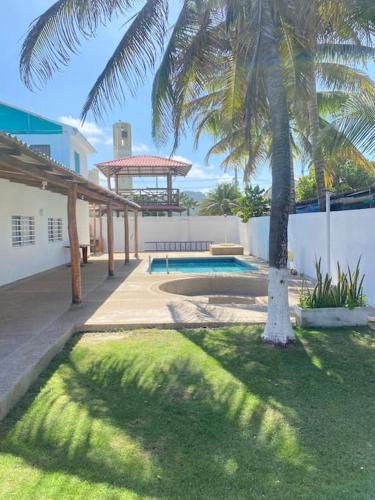 Cabaña con piscina y Cerca al mar VILLA CONEJO