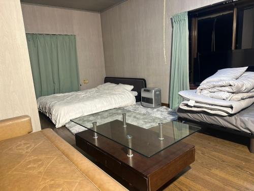 Economy Quadruple Room with Shared Bathroom