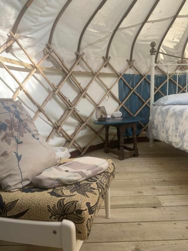 Ceridwen Glamping, double decker bus and Yurts