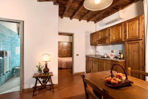  ISA-Residence with swimming pool surrounded by Tuscan nature in San Donato Fronzano, apartments with air conditioning and private outdoor area in San Donato in Fronzano