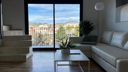 Dúplex con terraza by Prestigi - Apartment - Terrassa