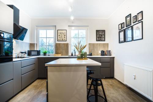 Cocina, BBQ I XXL Rooftop I Kamin I King I Kücheninsel I Wasch I WOOON Design BnB I (BBQ I XXL Rooftop I Kamin I King I Kucheninsel I Wasch I WOOON Design BnB I) in Mettingen