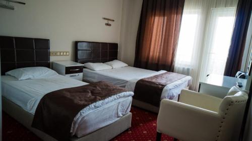 Chambre triple, 3 lits
