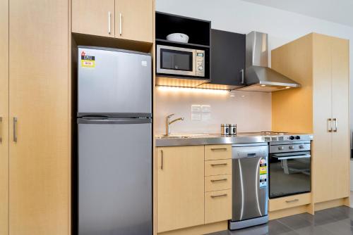 مطبخ, شقق مسنترال مانوكاو (MCentral Apartments Manukau) in مانوكو