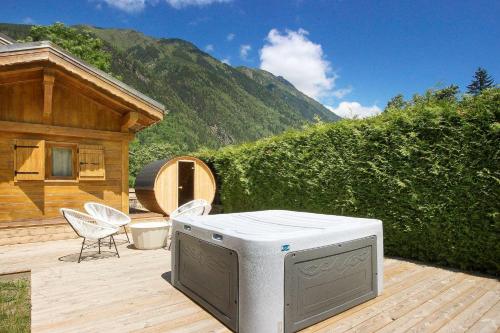 Chalet Béchar - 10pax - 155m2 Rénové - Sauna - Jacuzzi - Vues sur le Massif du Mont-Blanc gîte à louer Taconnaz