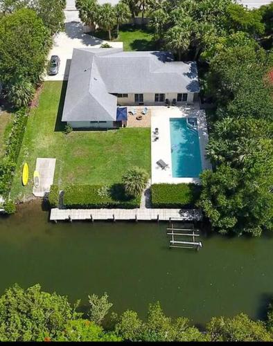 Vero Beach Island private gated scantuary with pool, 60' boat dock & kayak launch!
