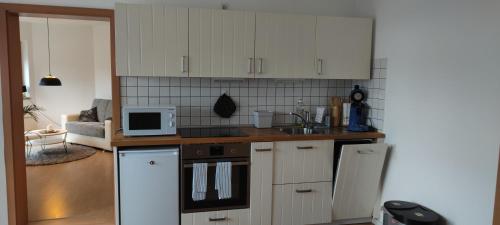 廚房, Moderne Ferienwohnung Lindlar, Dorf- und Waldnah, Gratis W-Lan, NR in 林德拉爾