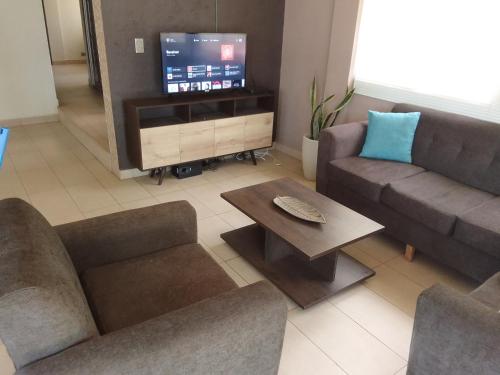 共用Lounge/電視區, Linda casa de campo con todas las comodidades de la ciudad in 科恰班巴