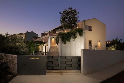 Casa Arbor Blanco in Fazana with heated pool, sauna & sea view only 500 meters from the beach
