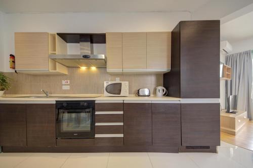 Stylish Sliema Apartments & Penthouse with Seaviews and Jacuzzis - Tap to explore photos